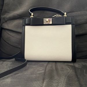 NWOT Kate Spade white & black two turn locks